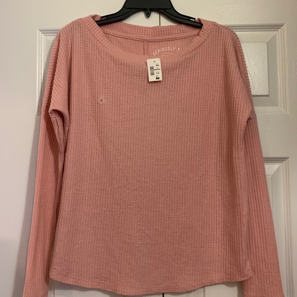 Never been worn with tags on cozy top!